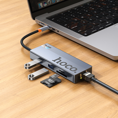 USB-C rozbočovač HOCO HB52, 2 x USB-A 3.0 - 2 x USB-C - 1 x HDMI - 1 x RJ45 - 1 x SD - 1 x microSD, Sivý